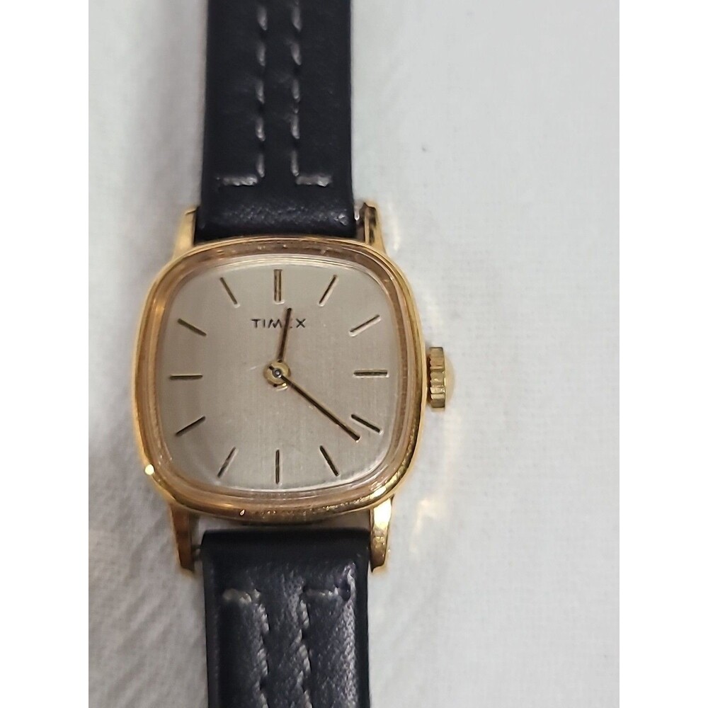 Timex Gold Tone Case Analog Ladies With Black Letter Band  needs battery